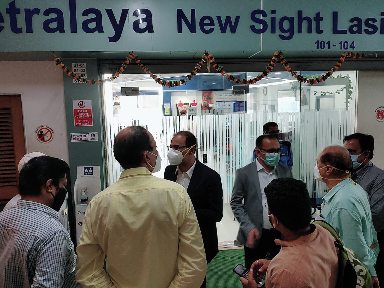 doctors standing in front of the clinic